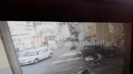 Newsflare Edit - Shocking moment 70 feet long crane crashed in India