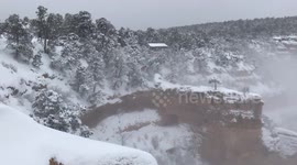 Heavy snow falling in Grand Canyon National Park.