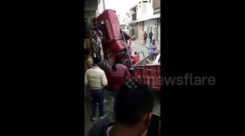 Tractor climbs electric pole after prank goes wrong