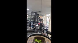 Girl in the gym exercising her booty on the trampoline for abs