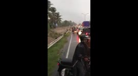 River Berantas,  malang, indonesia, overflowing and soaking the road across East Java province