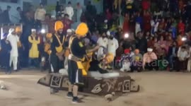 Terrifying moment Sikh do martial arts Break down Ice with Hamer in India.