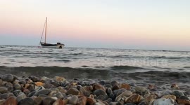 Boat bobbing on the sea