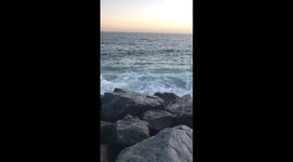 Cool waves crashing on rocks