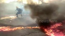 Terrifying moment Sikhs do martial arts by fire in India.