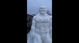 US dad builds immense statue of Batman out of snow for his kids