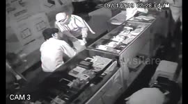 Masked robbers break into mobile shop and steal only smartphones
