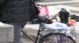 Homeless people on the downtown streets of Toronto's wealthy business district