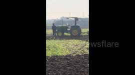 Man meets an ill fate and come under tractor wheel