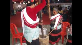Nepal Traditional way of making rice flakes..
