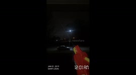 Man in America fires off his water pistol to bring in the New Year