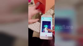 Future fashion? Woman in China shows how a 'nail printer' works