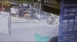 Heart-stopping moment three bike riders tumble out safely after coming under a speeding bus