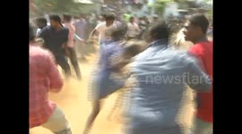 Disturbing video's Two injured while Bull fell inside well while cleabreating Jallikattu in southern India.