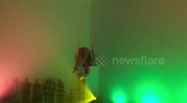 Circus arts performer on the Aerial Trapeze