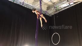 Circus arts student performs on the Aerial Silks