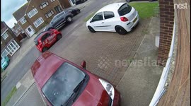 Car drives 'over' smart vehicle like tank