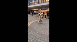 Old woman lives life to the full and dances like no one is watching