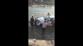 Fail! Driver forced to swim for it after his pick up truck washes off slipway