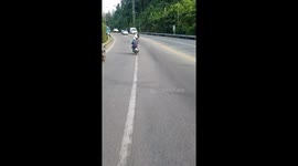 Carrying suitcases to the airport while riding pillion on motorcycle