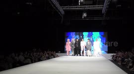 Graduating student Michael Longo and models of NB Haifa School of Design present Haute Couture hand made fashion during final catwalk.