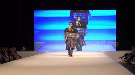 Graduating student Ben Zohar and models of NB Haifa School of Design present Haute Couture hand made fashion during final catwalk.