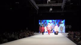 Graduating student Aharon Genish and models of NB Haifa School of Design present Haute Couture hand made fashion during final catwalk.