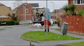 Shocking video shows delivery driver hurling parcels off his lorry onto a residential street