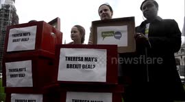 Supporters of a 'people's vote' on Brexit campaign outside Parliament the day before MPs vote on May's plan