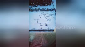 Father creates giant Peppa Pig out of snow for daughter