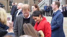 Meghan and Harry cuddle crying schoolgirl on first joint engagement of 2019