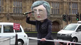 Theresa May effigy sails boat into iceberg on day of Brexit vote