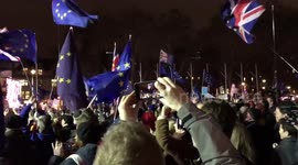 Pro-EU protesters react to May's Brexit Commons defeat