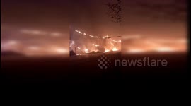 Power lines cause huge fire in Chinese city damaging vehicles