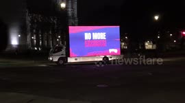 Van drives around Parliament Square with light-up sign demanding Brexit