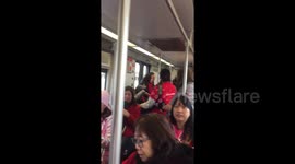 LA teachers break into rally chants on Metro enroute to second day of strikes