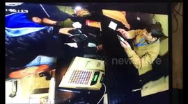 Terrifying moment irate customer fires at hotel manager