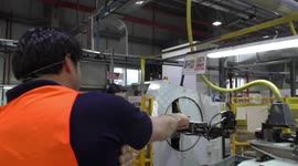People working on a modern factory