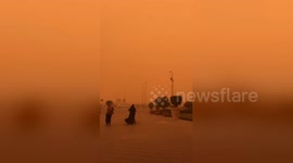 Incredible Cairo sandstorm dyes entire sky orange