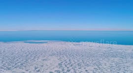 Spectacular drone shows China’s largest saltwater lake freezing