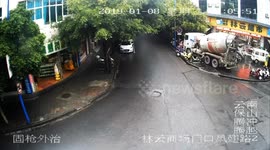Driverless cement truck slides downhill and crashes onto pavement