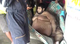 700 pound man who gorged on seafood and ice cream for two decades is rescued from his house