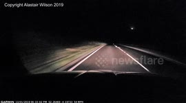 Man catches fiery meteorite in the night sky on dashcam