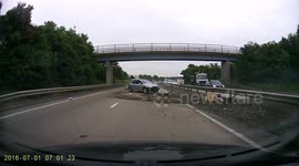 Car seemingly loses control and crashes into lorry on motorway