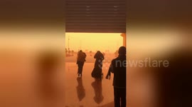 Shopper walks out of Cairo mall to find the sky an eerie orange