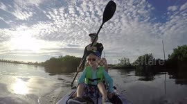 funny timed Tarpon strike rips pole out of 5yr old's hands on paddleboard