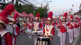 Thai students in marching band perform pop song covers