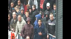 Ajax fans throwing firecrackers towards FC Utrecht fans