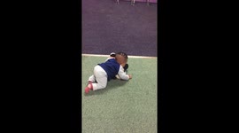Baby fighting with teddy bare