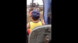 'Look what I got for Christmas!' Vietnamese boy, 6, operates a real digger